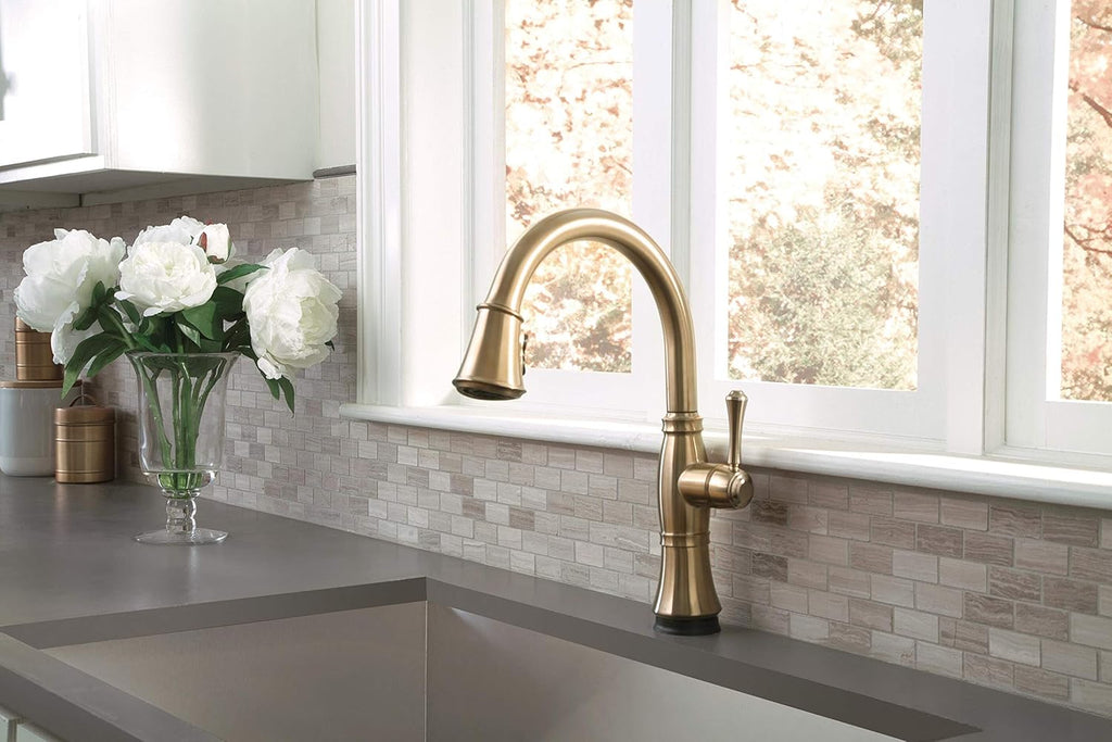 Delta Faucet Cassidy Gold Touch Kitchen Faucet with Pull Down Sprayer Q4944